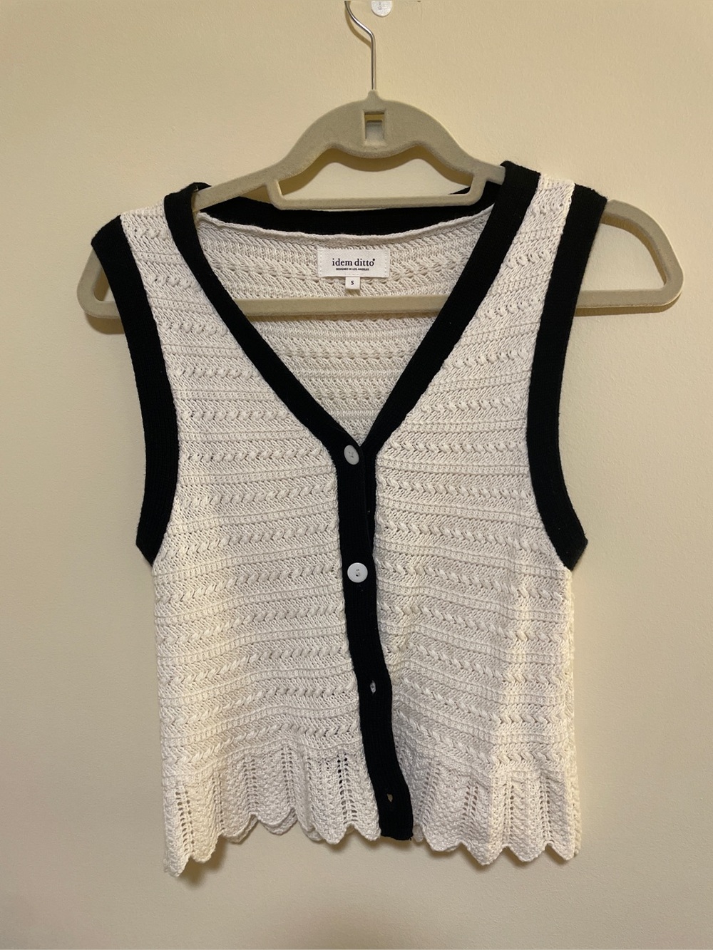 Cream Knit Button-Front Sleeveless Sweater with Black Trim